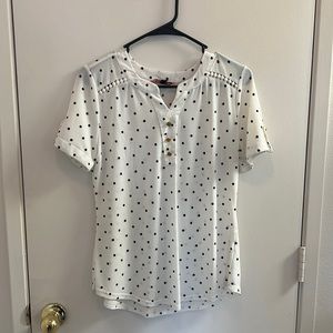 50th Street Short Sleeve Blouse with Faux Buttons and Collarbone Lace Detail.